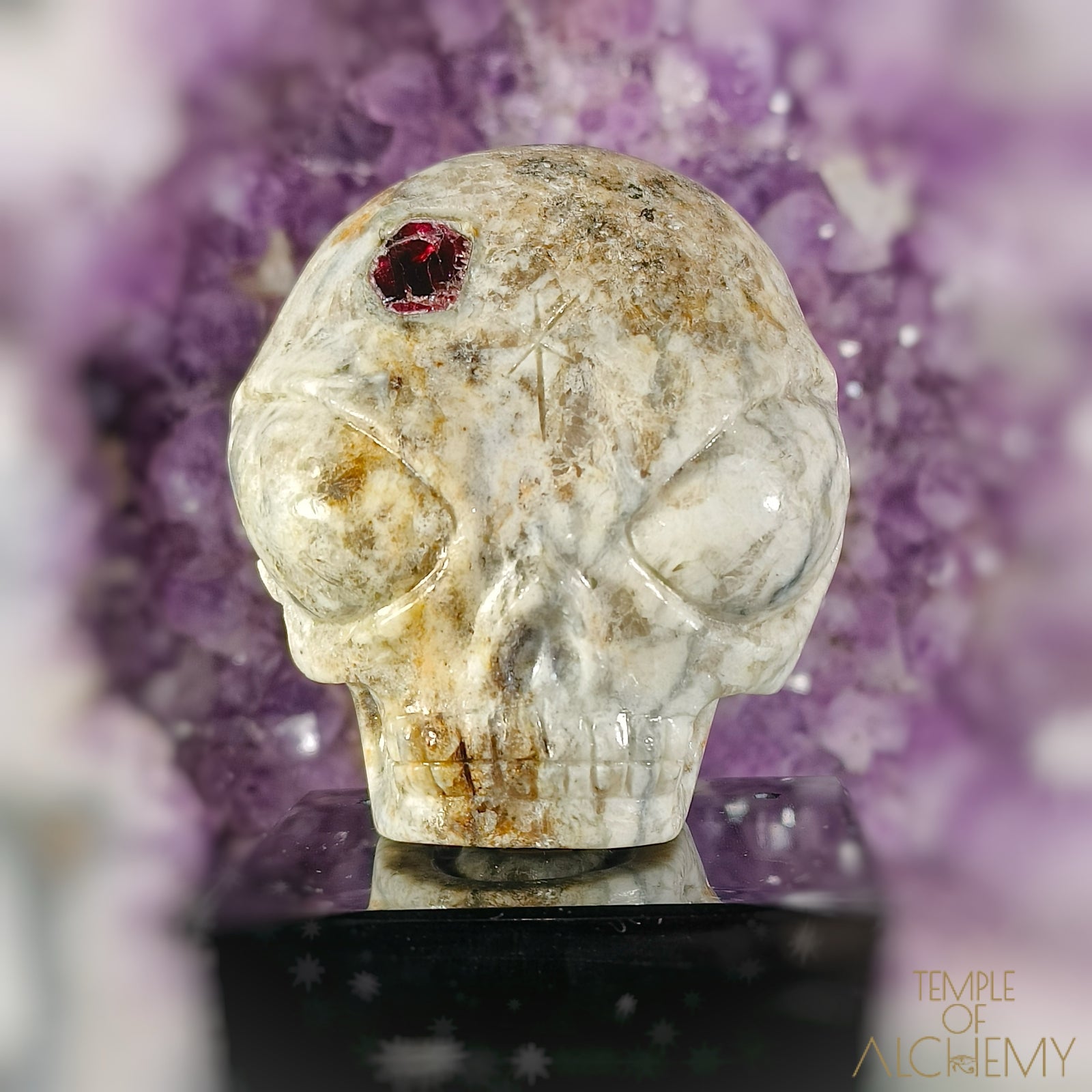 Triphylite X Garnet