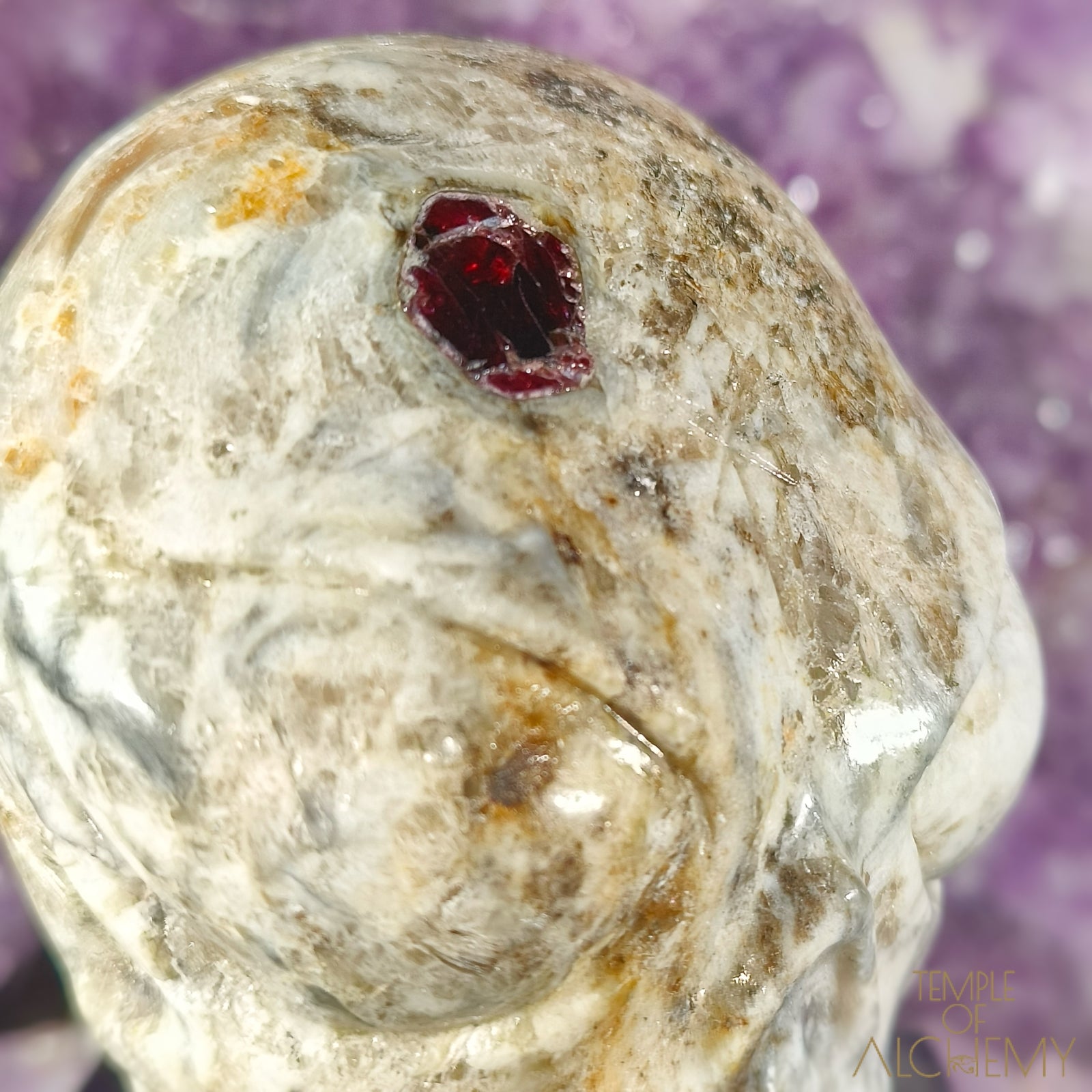 Triphylite X Garnet
