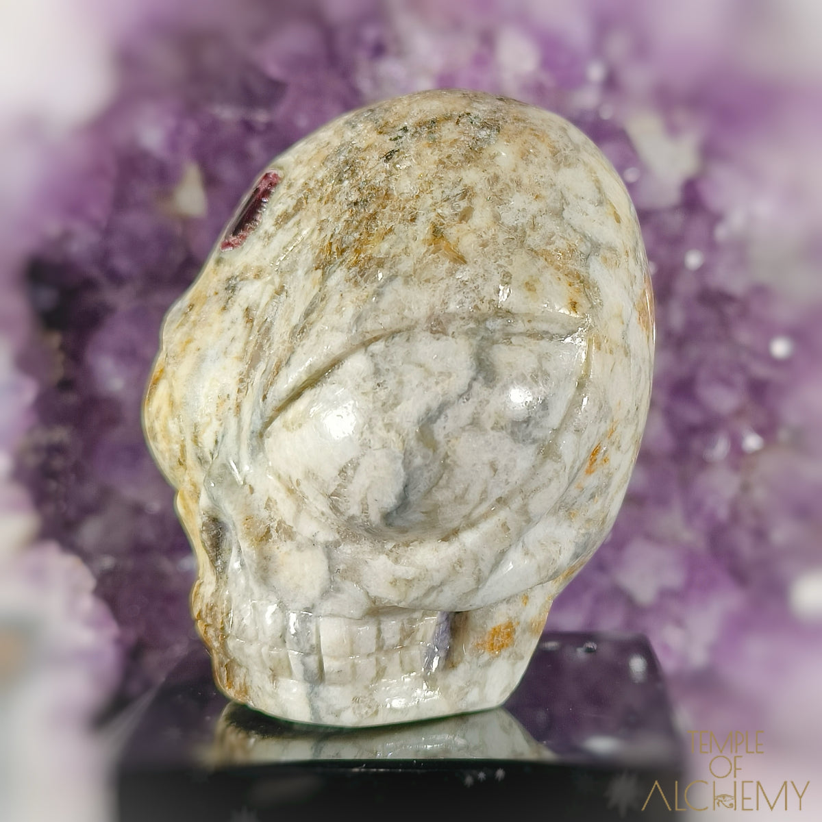 Triphylite X Garnet