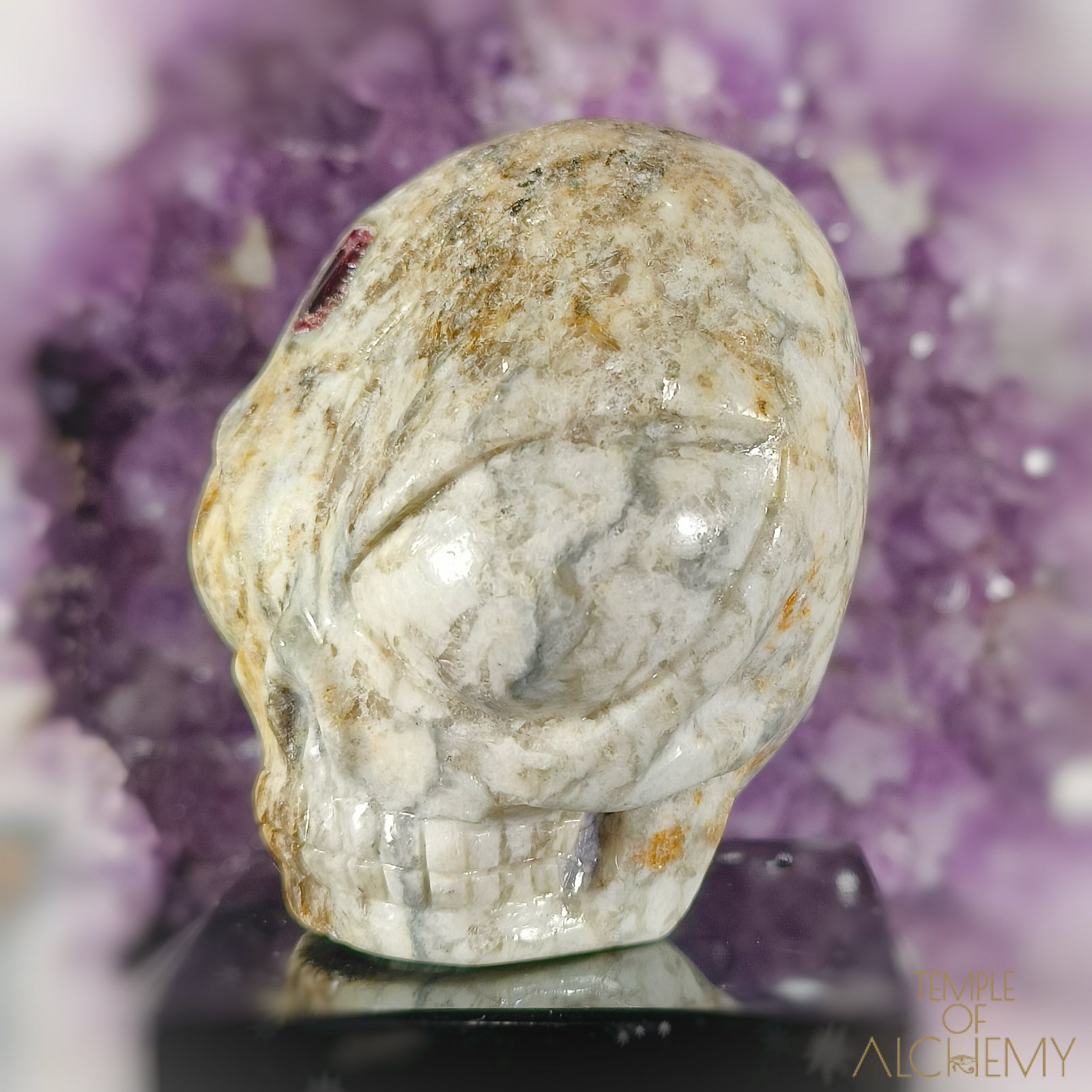 Triphylite X Garnet