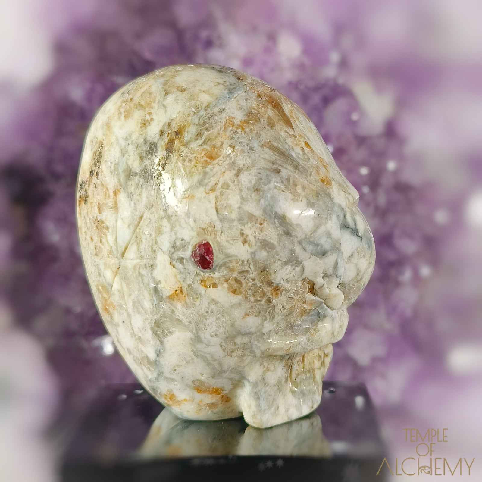 Triphylite X Garnet